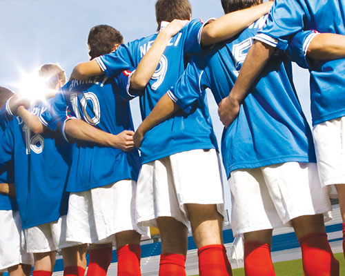 Soccer team lining up before a game