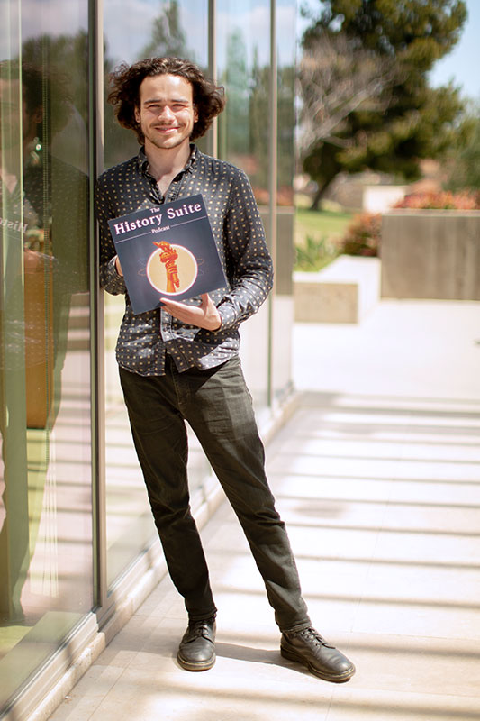 Augustine Mallinson holding one of his projects