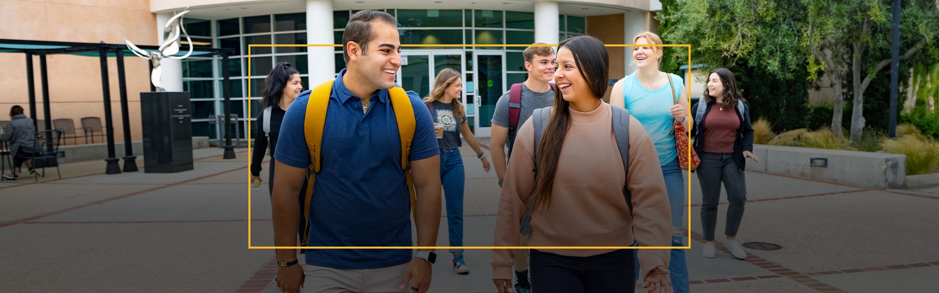 Concordia students walking outside the main building