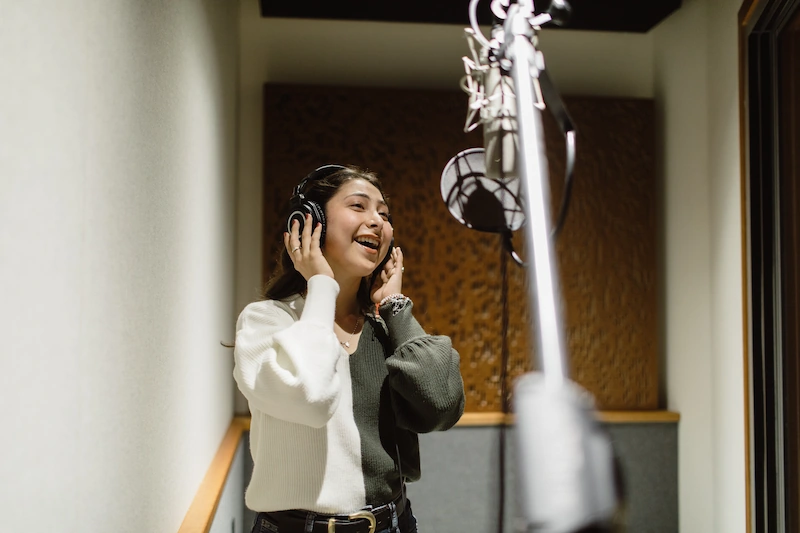 Majo singing in Concordia's recording studio