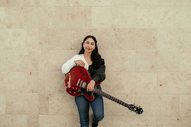 Majo singing in Concordia's recording studio