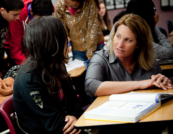 Kati talks with a student