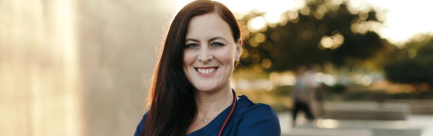A woman smiling at the camera