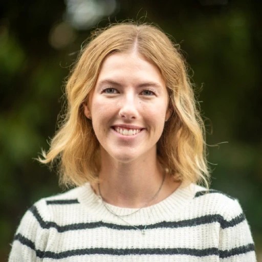 A woman smiling for a picture