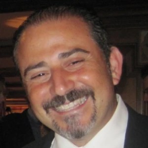 A man smiling at the camera