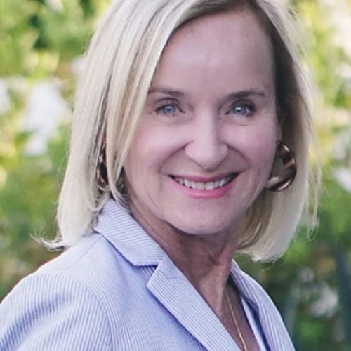 A woman smiling at the camera