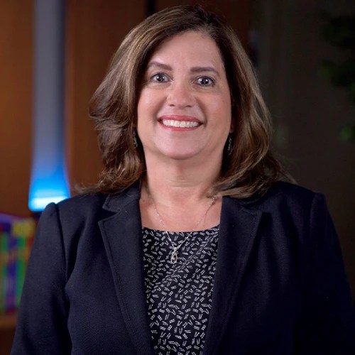 A woman smiling at camera