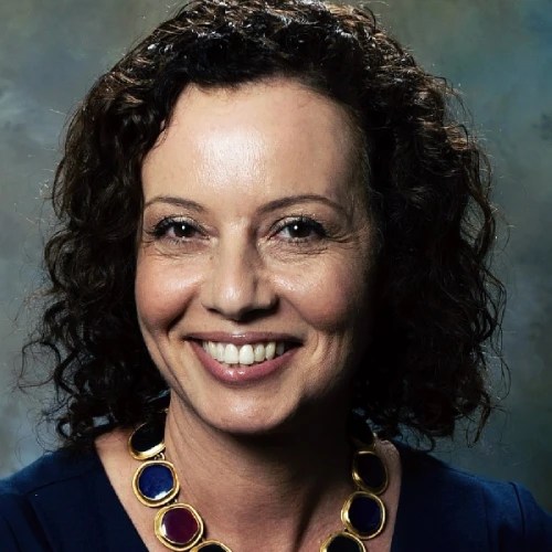 A woman smiling for the camera