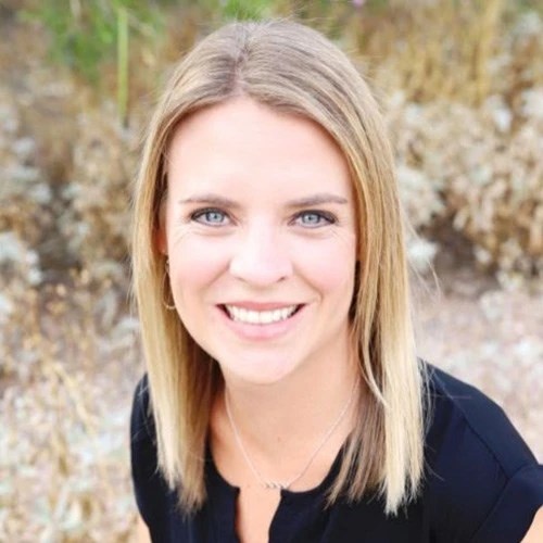 A woman smiling at camera