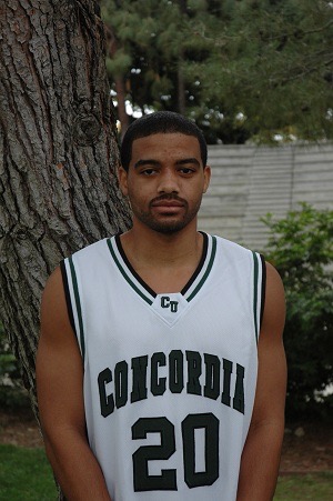 A man in a basketball jersey