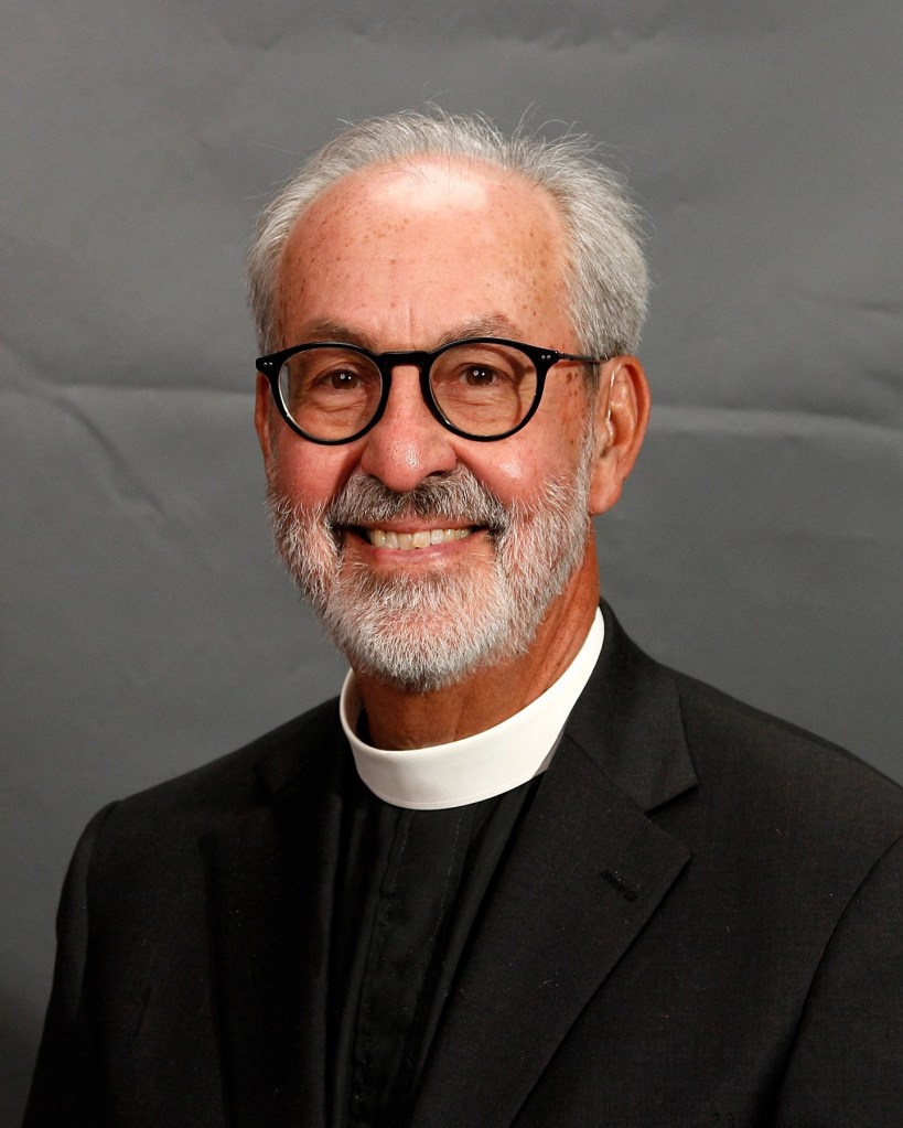 A man in a priest's robe