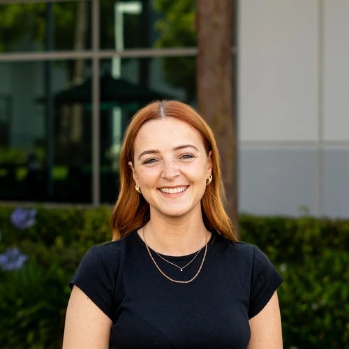 A woman smiling at camera