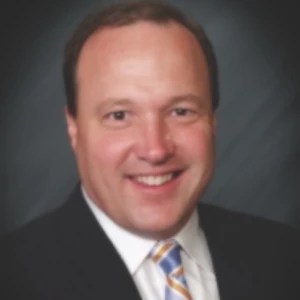 A man in a suit and tie