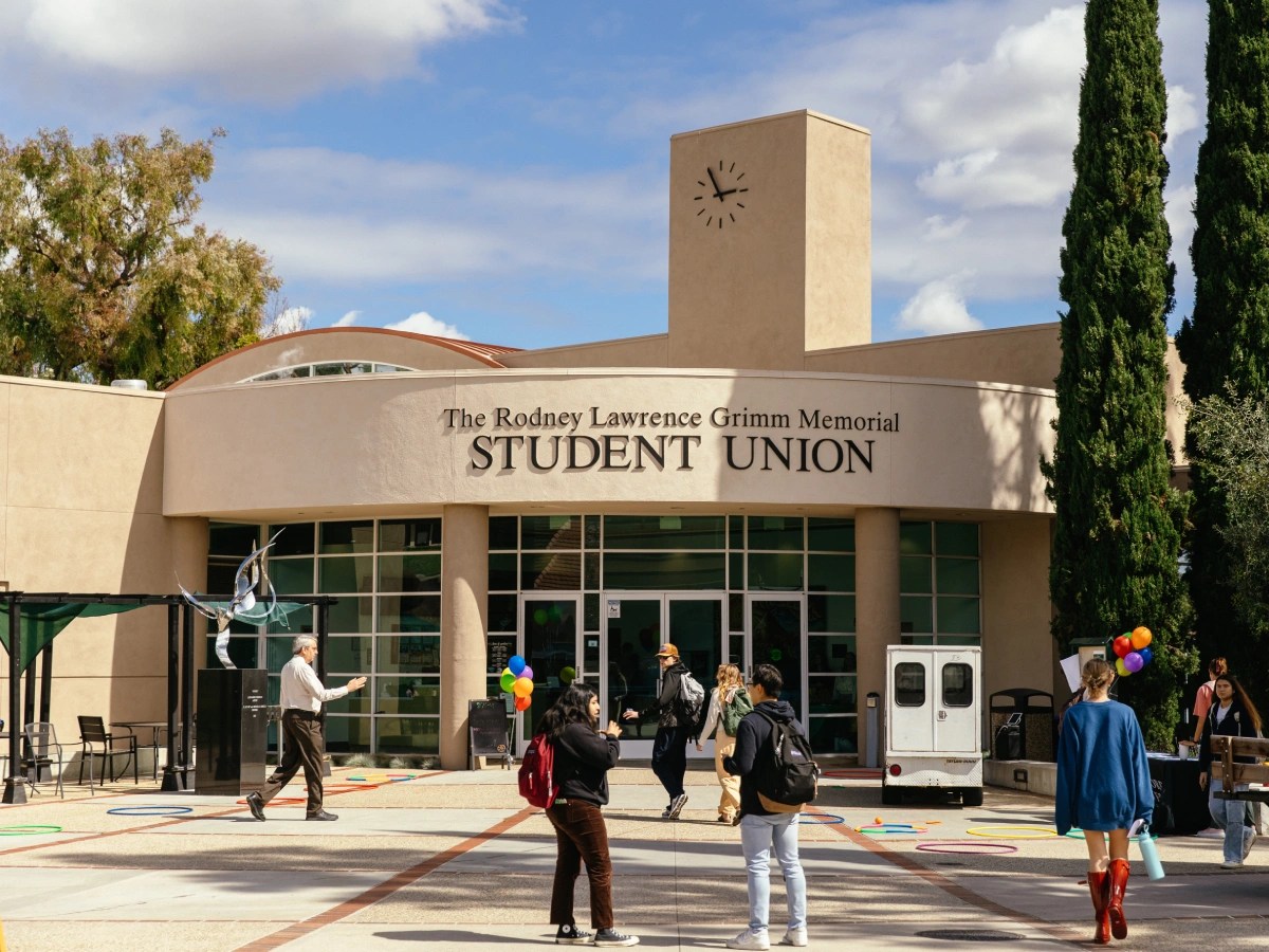 A group of people outside of a building