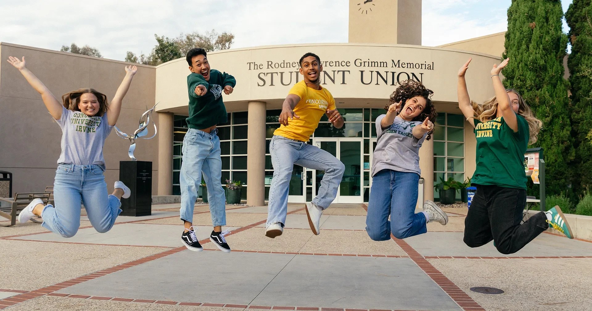 A group of people jumping in the air