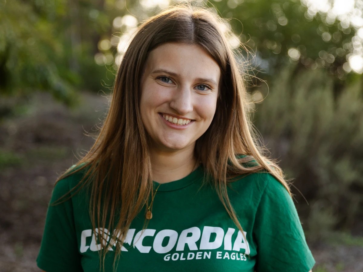 A woman smiling at camera