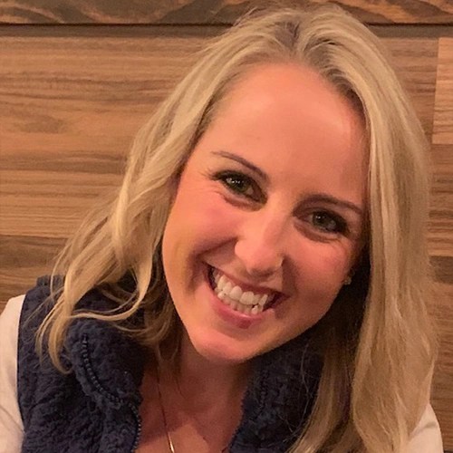A woman smiling at the camera