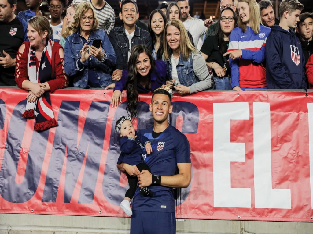 Christian Ramirez and his family posing for a picture