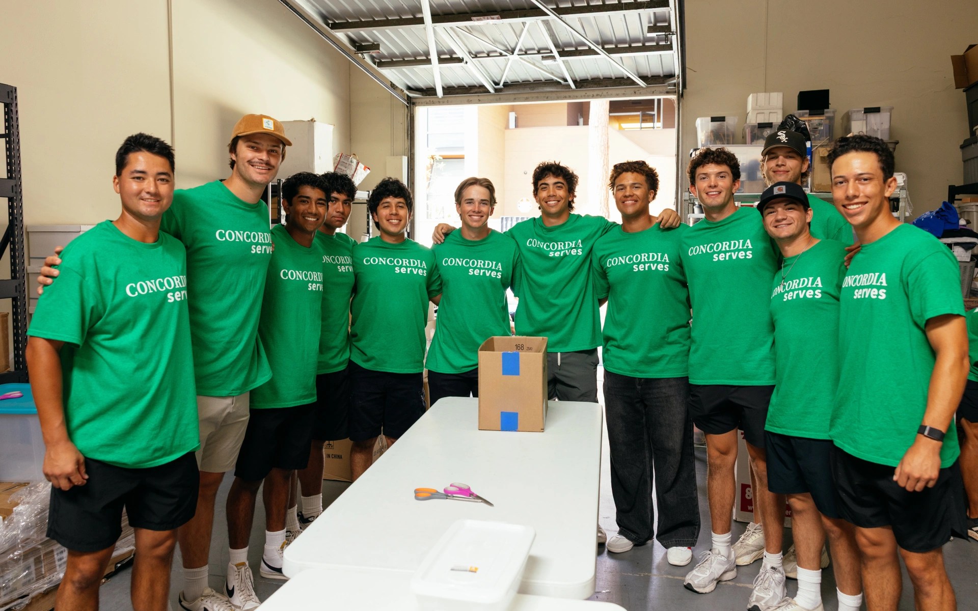 A group of people wearing green shirts