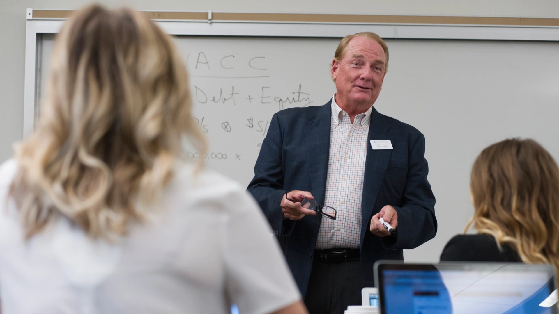 Instructor speaking to students during a classroom lecture at Concordia University Irvine