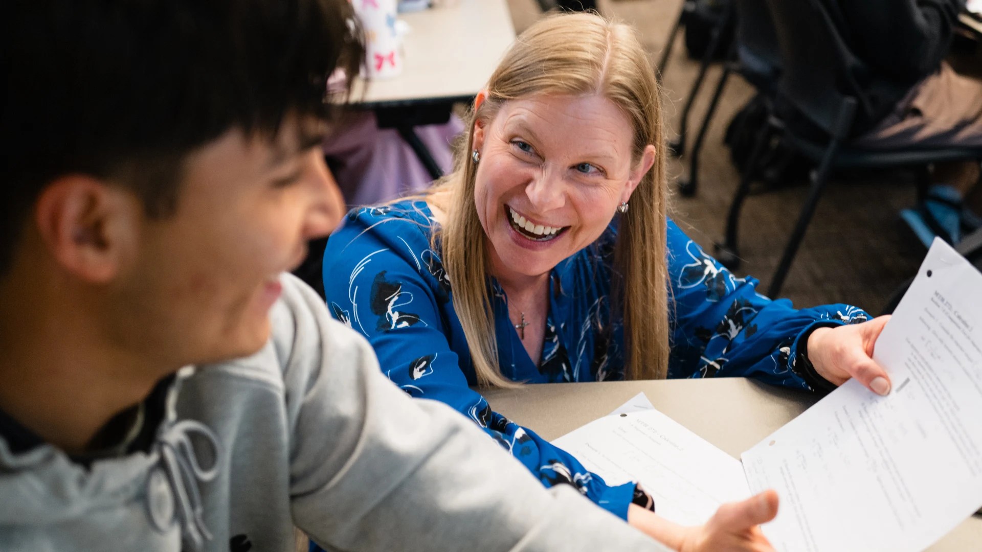Professor interacting with a student during class at Concordia University Irvine