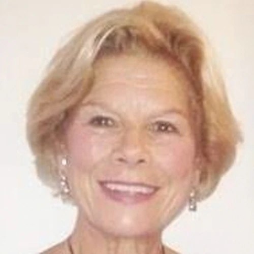 A woman smiling for the camera
