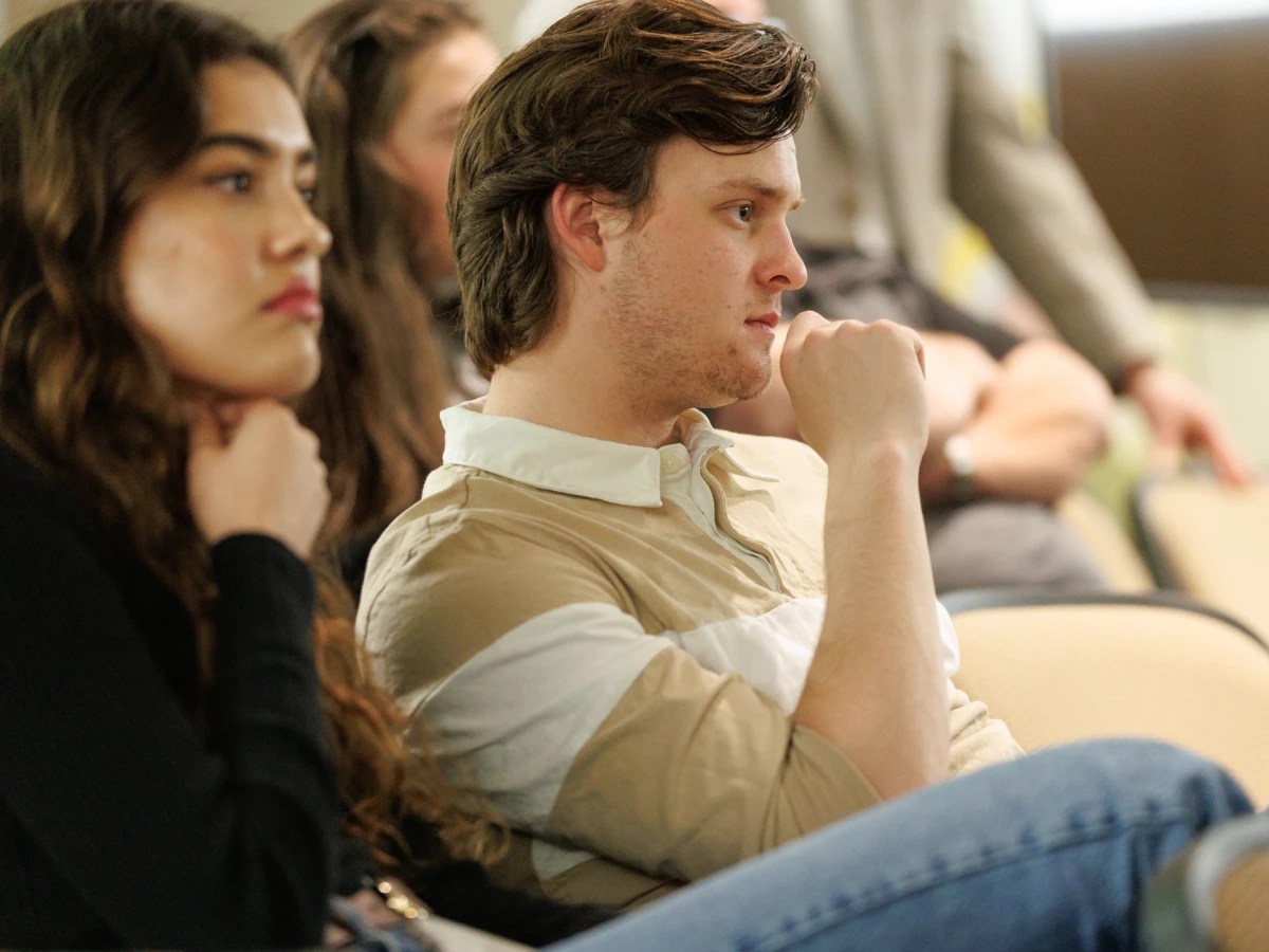 A man and woman sitting in chairs