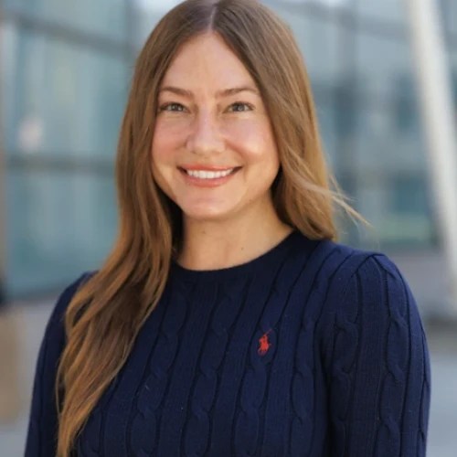 A woman smiling for the camera
