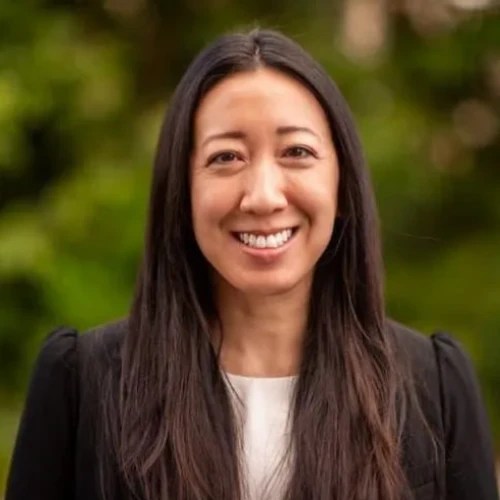 A woman smiling for a picture