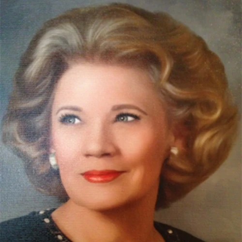 A woman with blonde hair and red lipstick