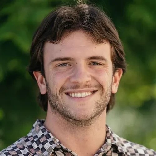 A man smiling for a picture