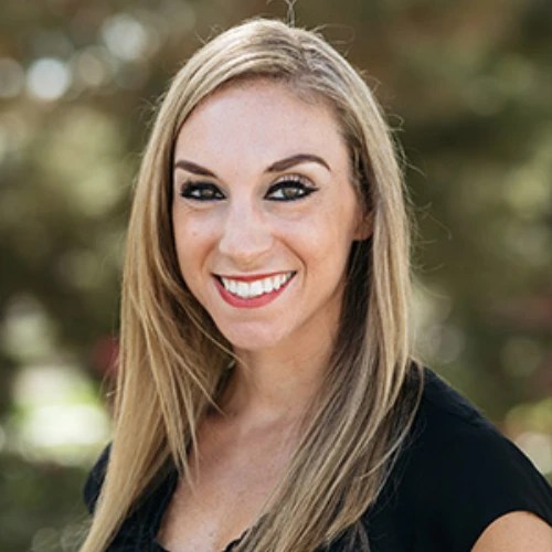 A woman smiling at camera