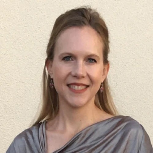 A woman smiling at the camera