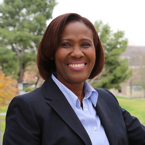 A woman smiling at the camera