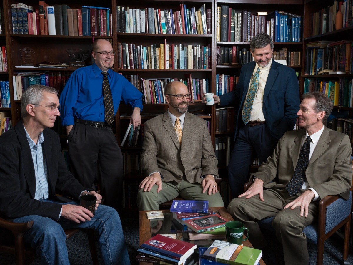 A group of men in suits