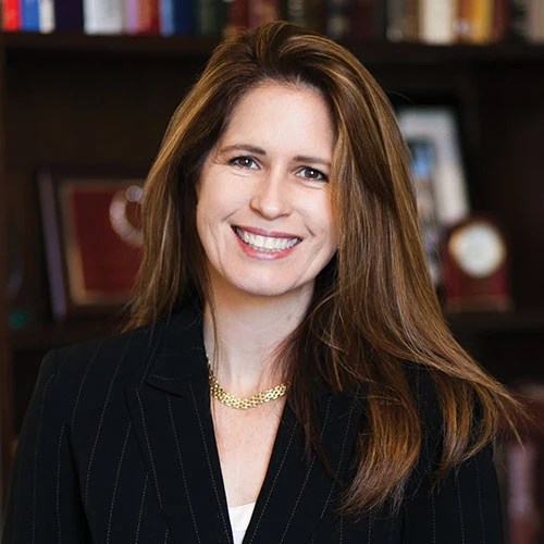 A woman smiling at camera