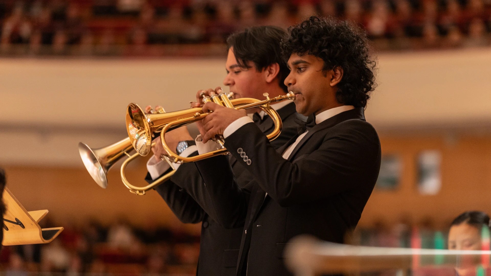 A group of men playing trumpets
