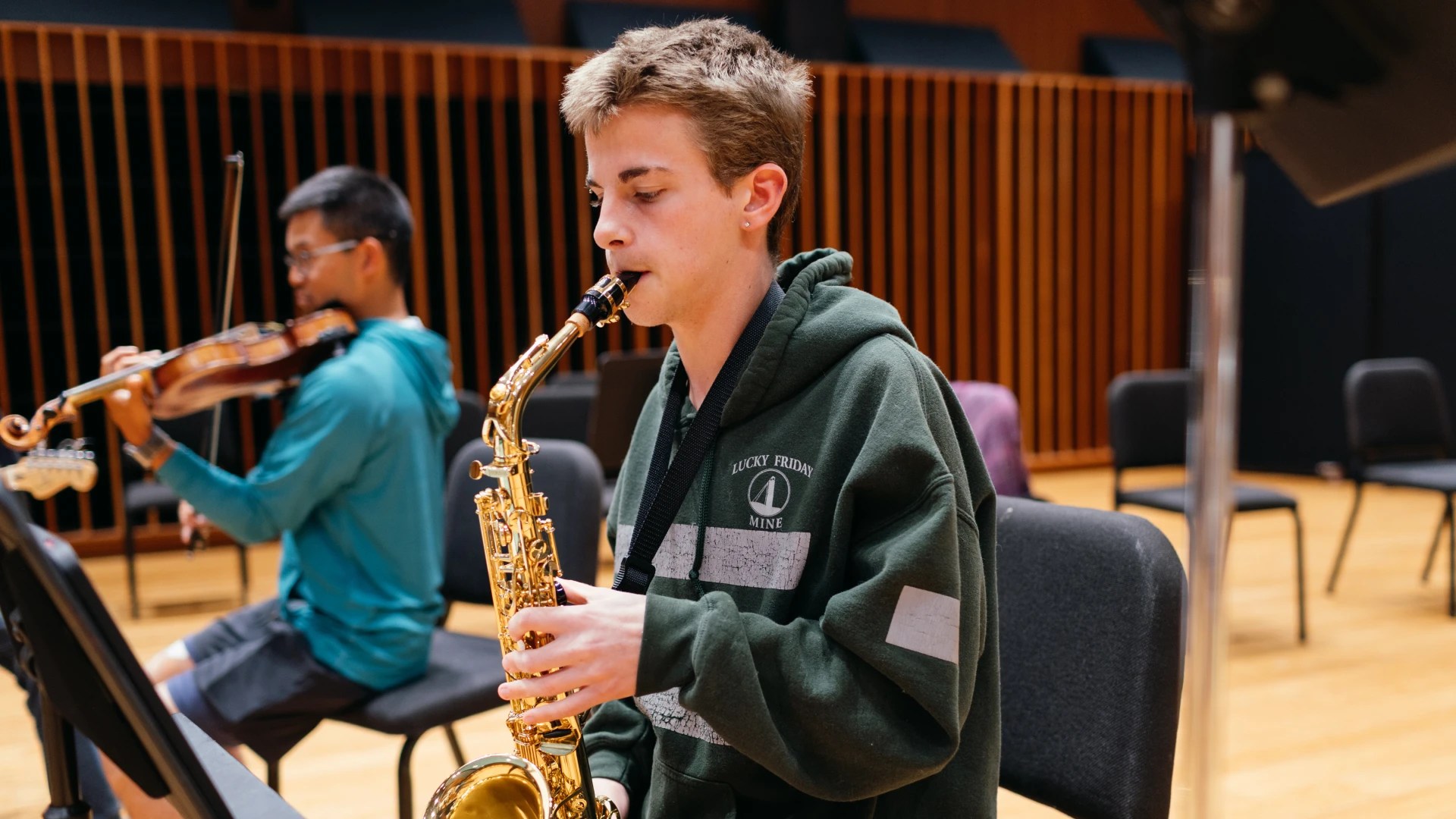 A man playing a saxophone