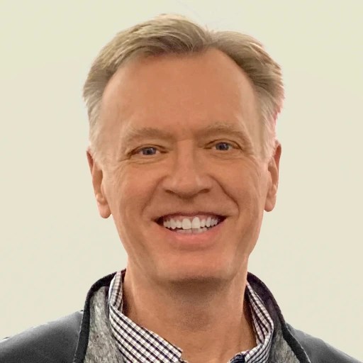 A man smiling at the camera