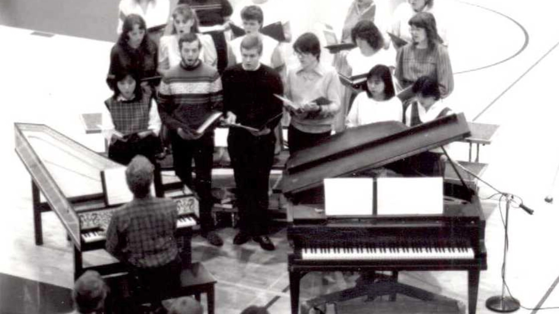 A group of people singing in a choir
