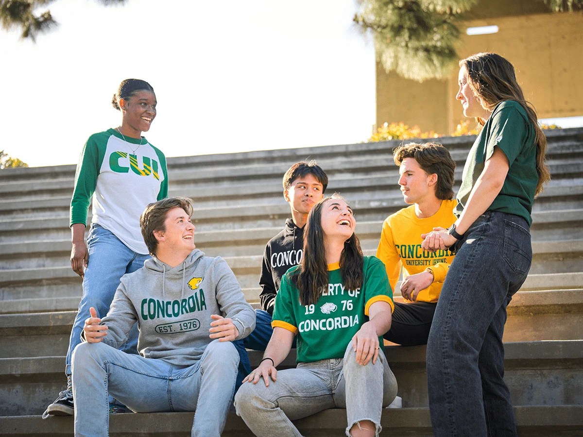 A group of people sitting on steps