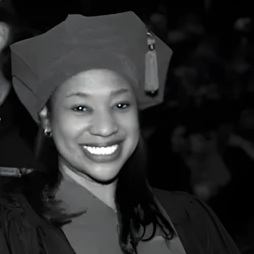 A woman wearing a graduation cap