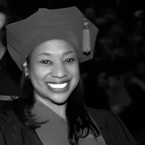 A woman wearing a graduation cap