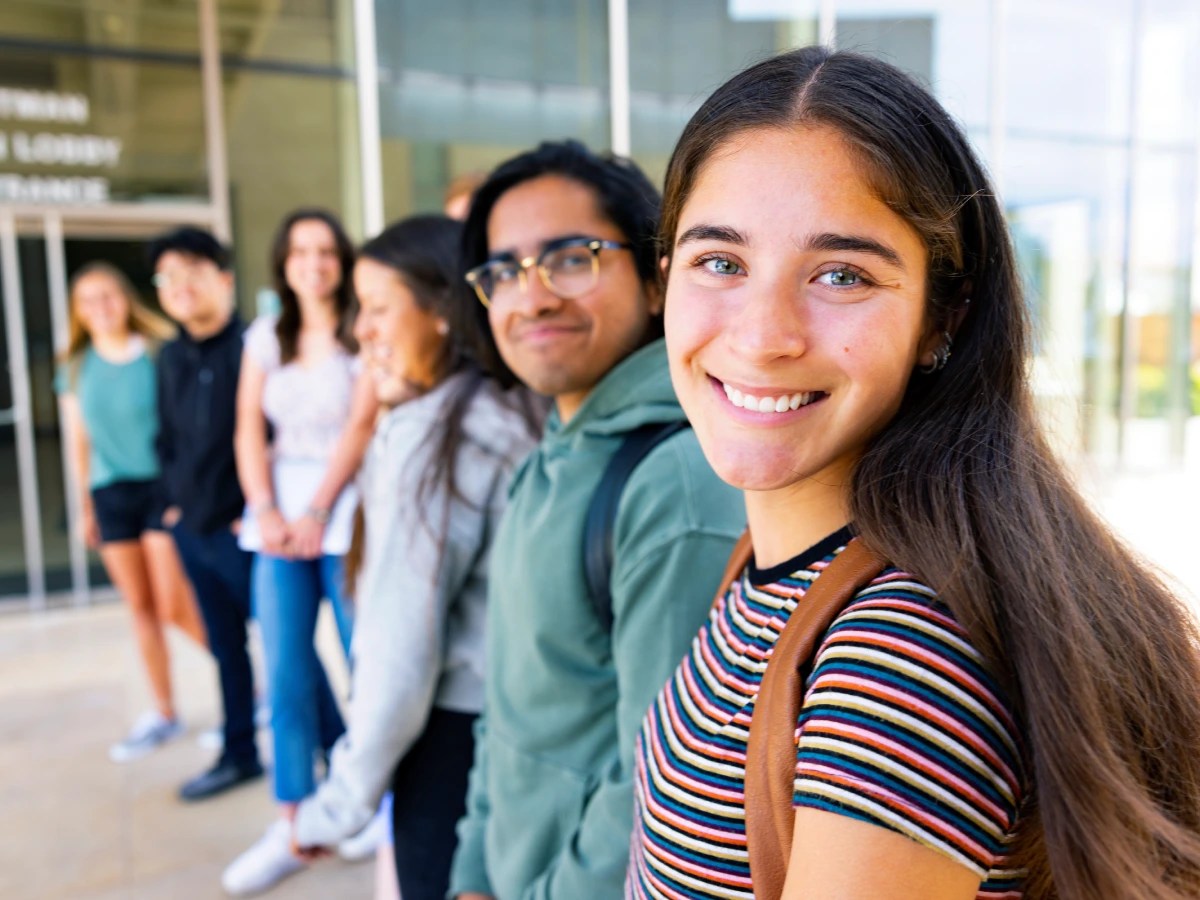 A group of people standing in a row