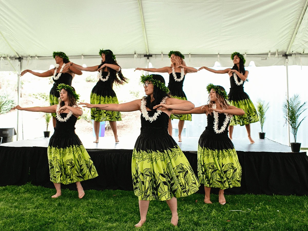 A group of women dancing on a stage