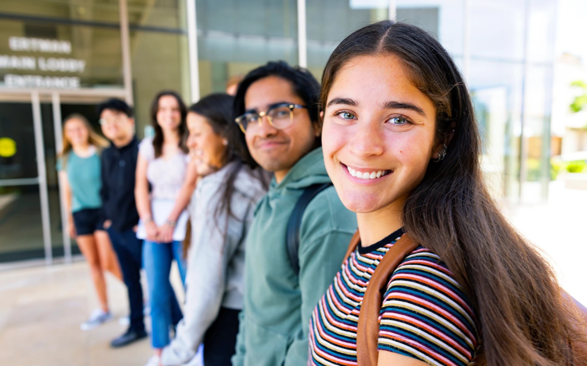 A group of people standing in a line