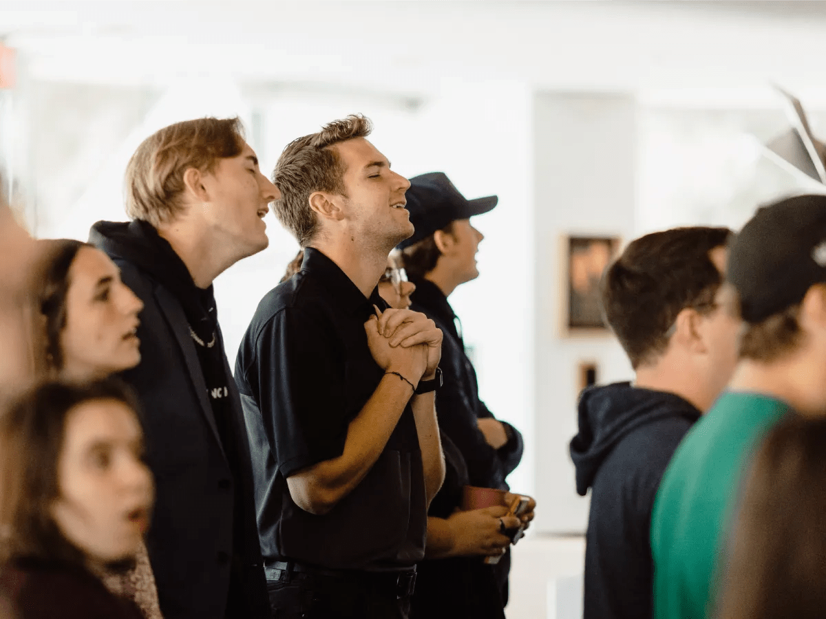 A group of people standing in a line