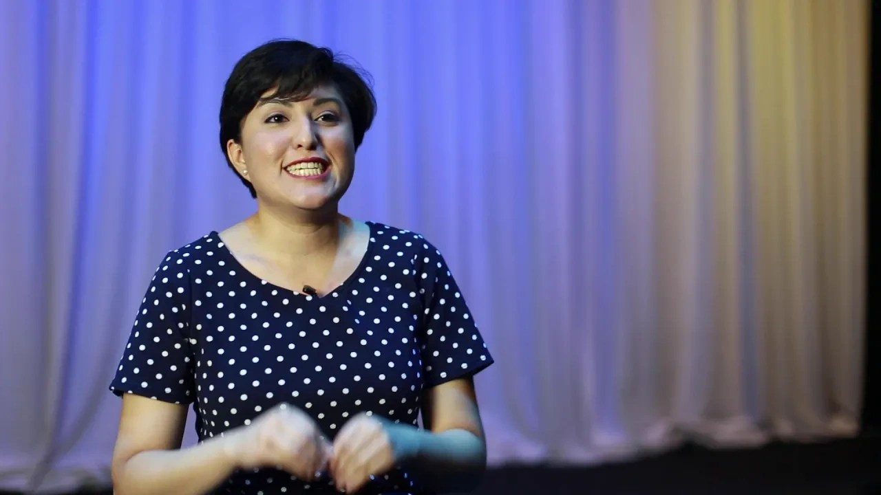A woman in a polka dot dress