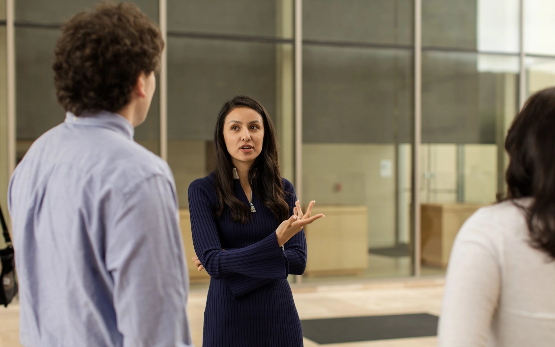A woman talking to a man