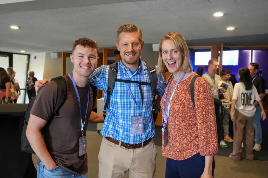 A group of people smiling for the camera